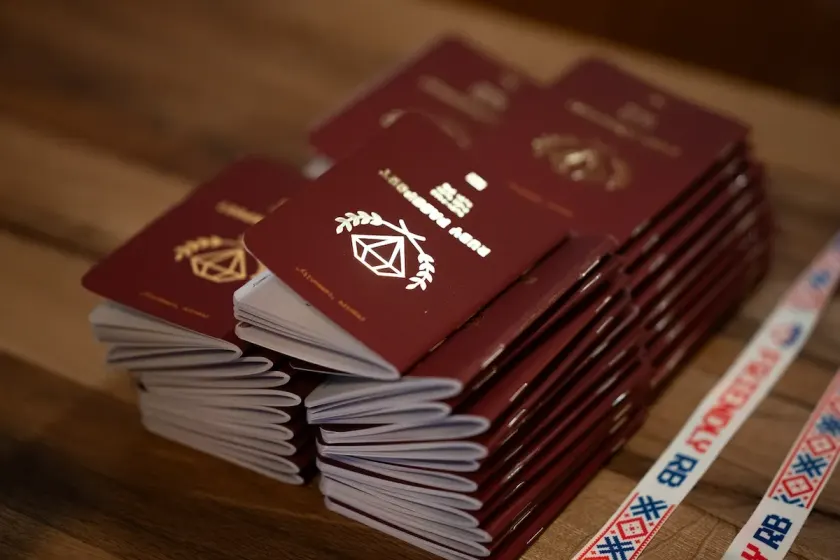 Ruby Passports stacked on a table at Friendly.rb Conf 2025